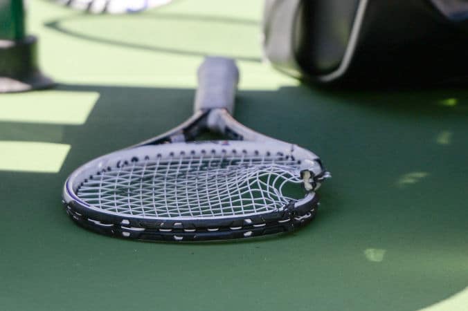 Damaged tennis racquet Indian Wells